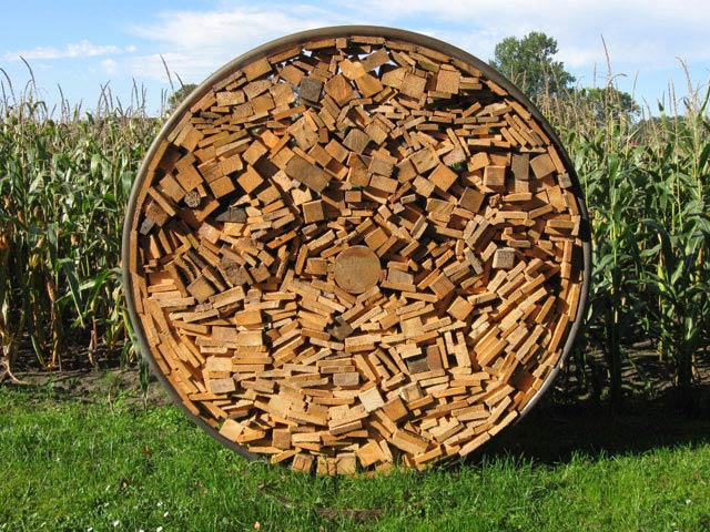 Holzdepot aus Stahlringen – rund ist warm